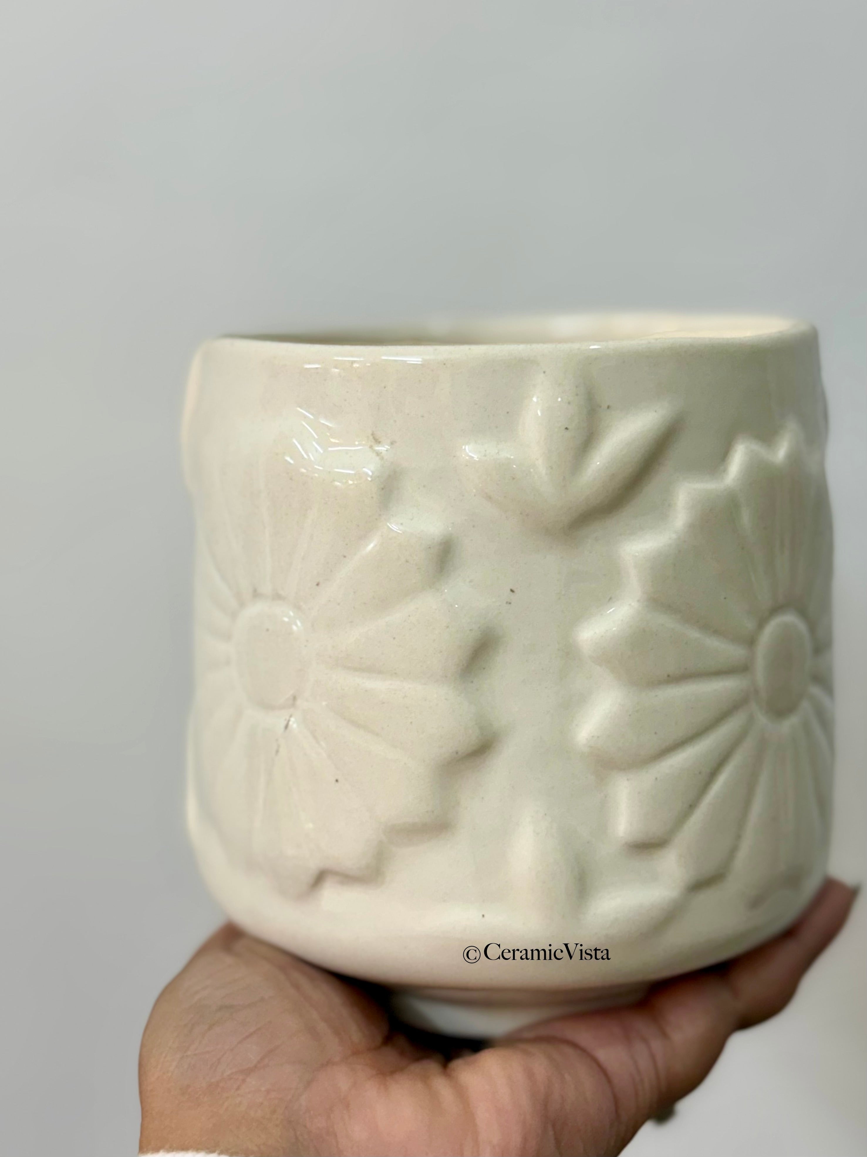 Ivory Daisy Embossed Ceramic Planter | CeramicVista